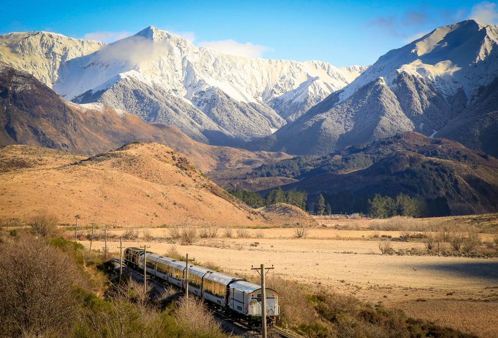 TranzAlpine heads into the snow-capped mountains at Cass