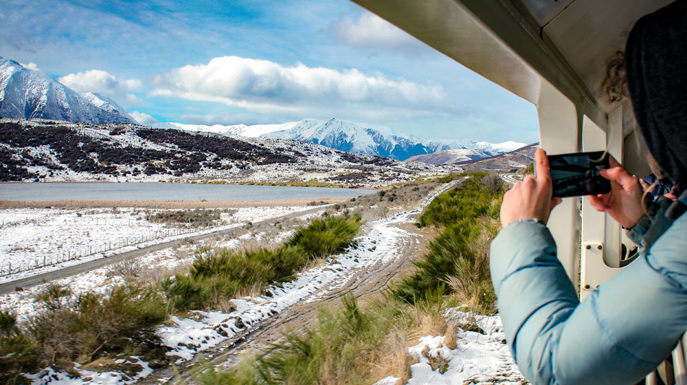  TranzAlpine train passes through the icy landscapes of the Saouthern Alps
